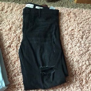 Hollister black ripped jeans.